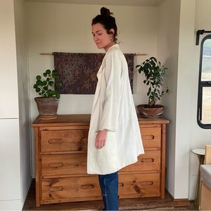 Australian brand Livia Arena white nurse coat with woven details